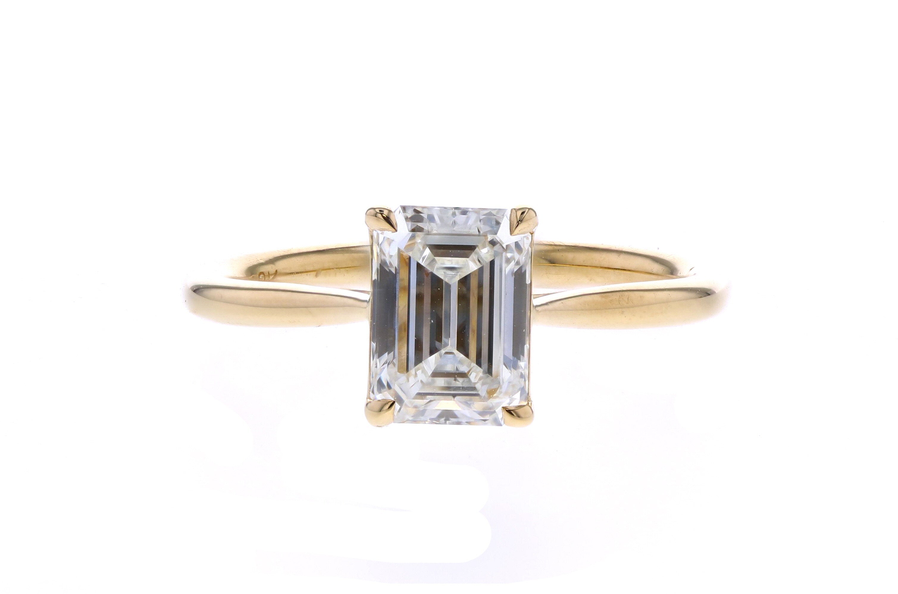 Emerald Cut Diamond Engagement Ring Solitaire In Yellow Gold
