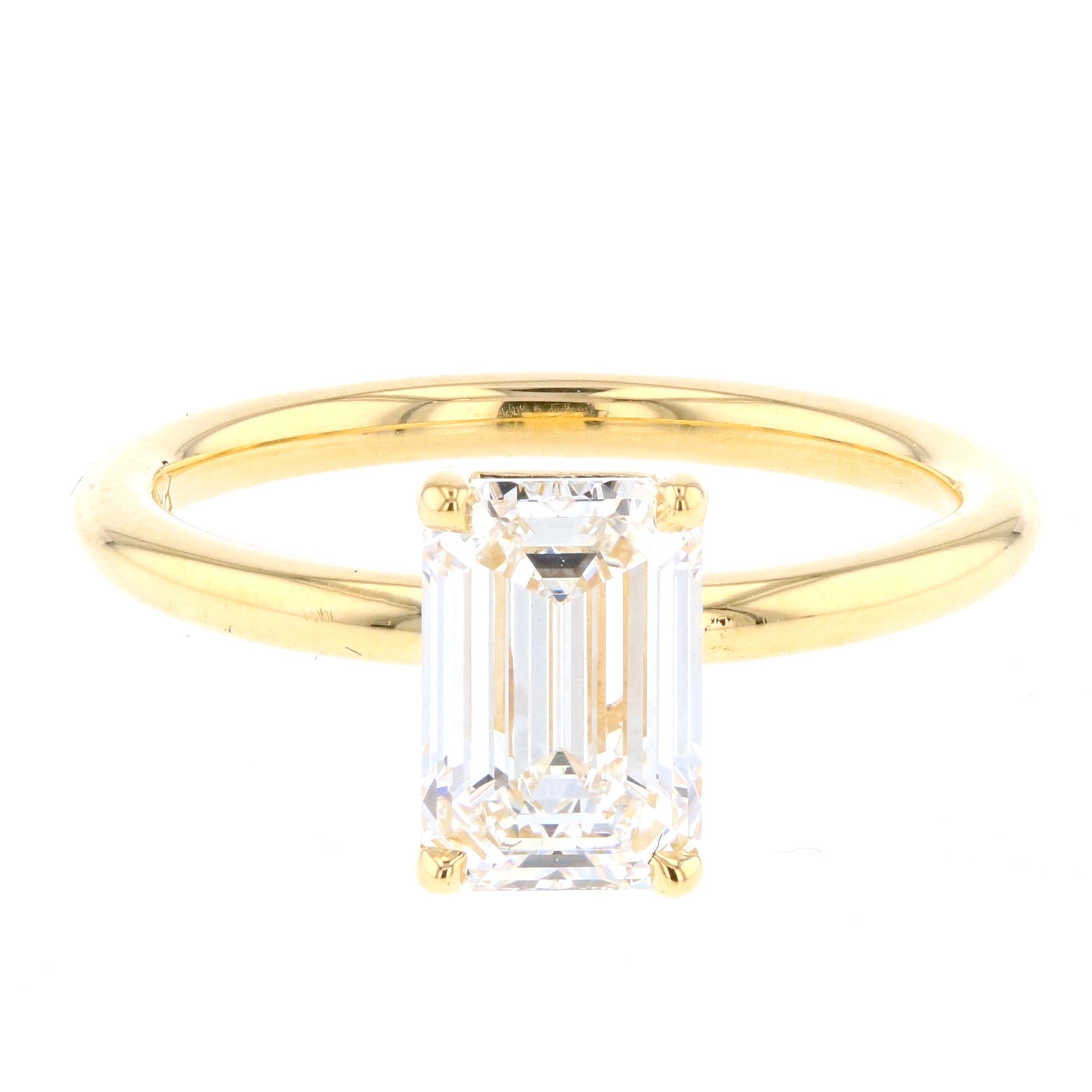 Emerald Cut Diamond Engagement Ring in Yellow Gold Solitaire