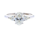 Oval Diamond Engagement Ring with Pear Shaped Side Stones