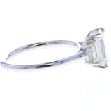 Emerald Cut Diamond Engagement Ring with Trapezoid Side Stones & Hidden Diamond Halo