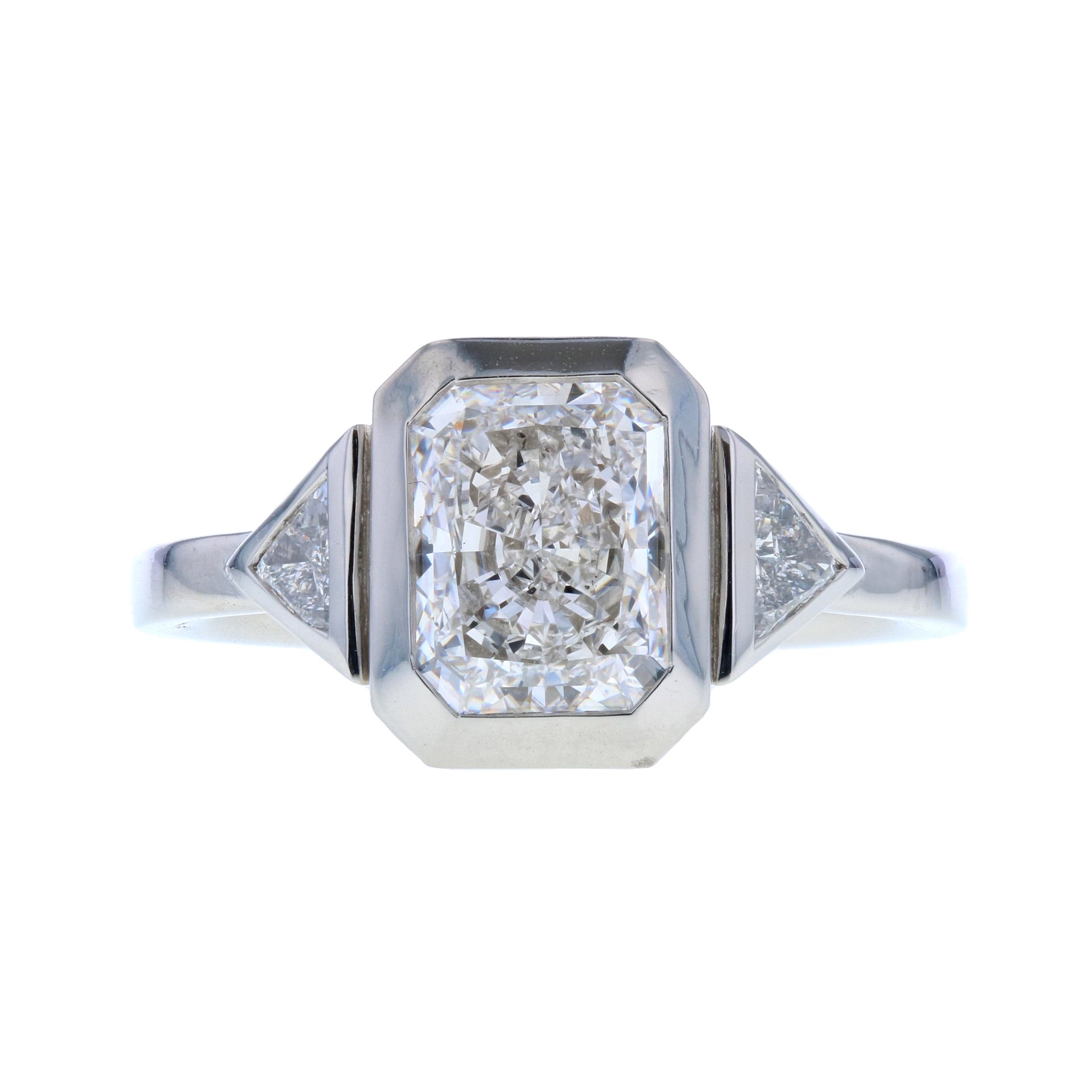 Radiant Cut Diamond Engagement Ring with Bezel Setting & Trapezoid Side Stones