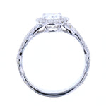 Round Cut Halo Diamond Engagement ring with Twisted Diamond band in White Gold