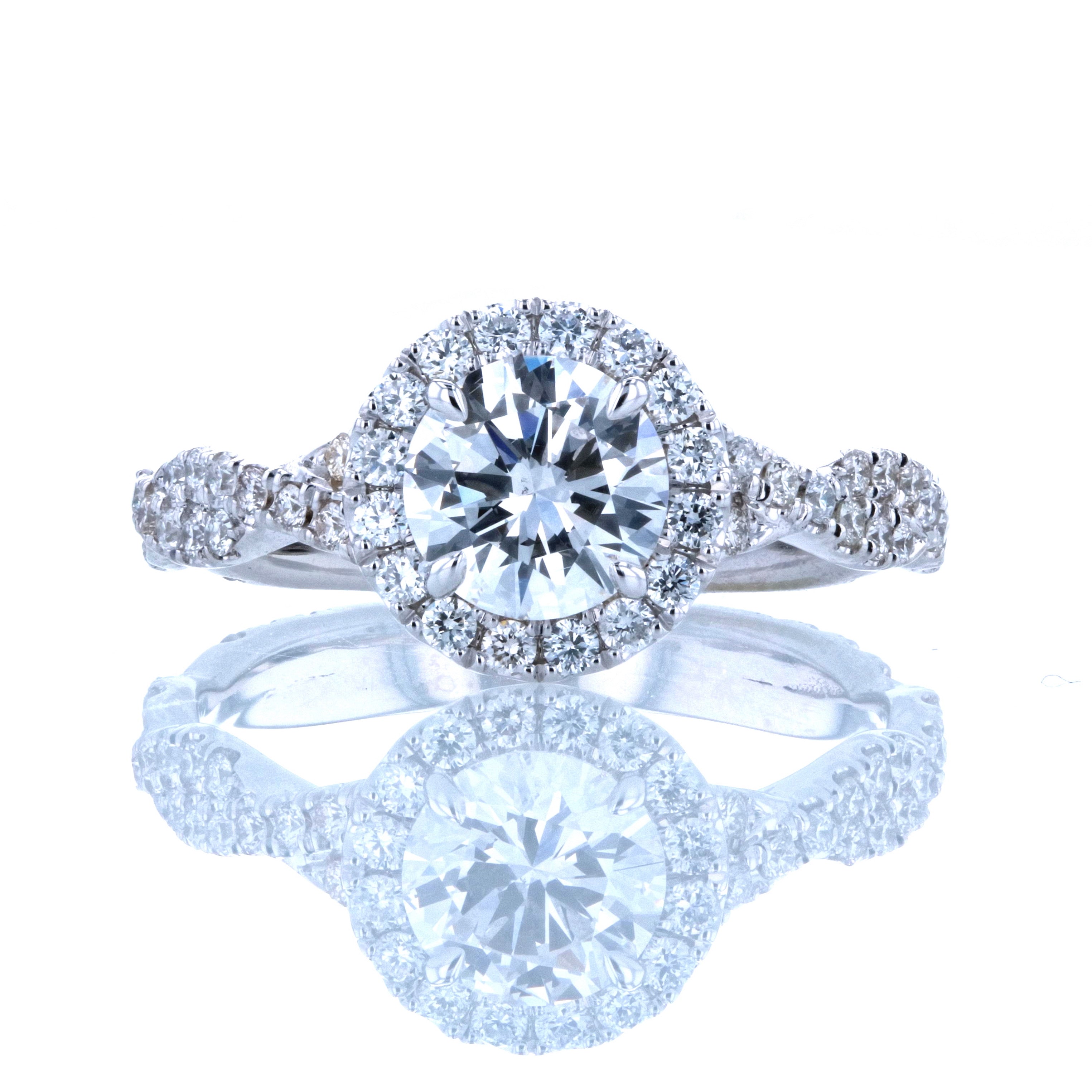 Round Cut Halo Diamond Engagement ring with Twisted Diamond band in White Gold